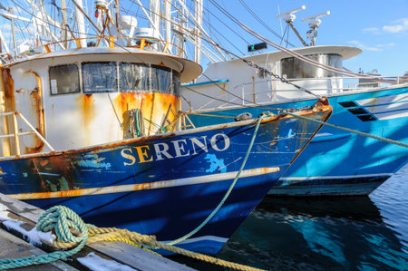 New Bedford, Massachusetts, USA - March 15, 2018: Fishing boat Sereno waiting alongside pier on Acushnet Riverのeditorial素材