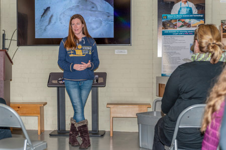 New Bedford, Massachusetts, USA - March 15, 2018: Fisheries biologist Crista Bank of the School for Marine Science & Technology at the University of Massachusetts Dartmouth giving a talk entitledのeditorial素材