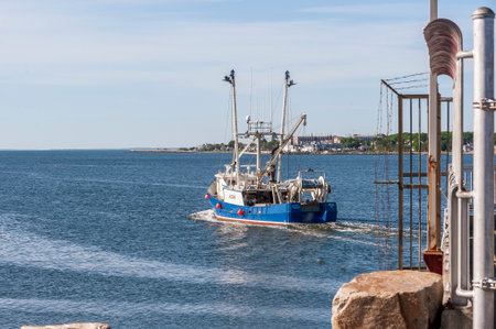 New Bedford, Massachusetts, USA - June 8, 2020: Commercial fishing boat Golden Nugget, hailing port Cape May, NJ, outbound from New Bedfordのeditorial素材