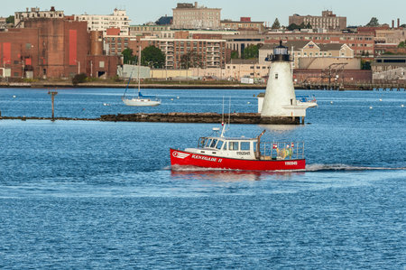 Fairhaven, Massachusetts, USA - October 17, 2018: Commercial fishing vessel Renegade II leaving Fairhaven with lighthouse in backgroundのeditorial素材