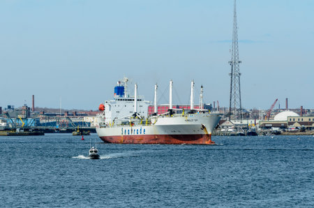 New Bedford, Massachusetts, USA - March 28, 2018: Refrigerated cargo ship Humboldt Bay leaving New Bedford harborのeditorial素材