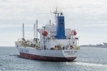 New Bedford, Massachusetts, USA - March 28, 2018: Refrigerated cargo ship Humboldt Bay  departing New Bedfordのeditorial素材