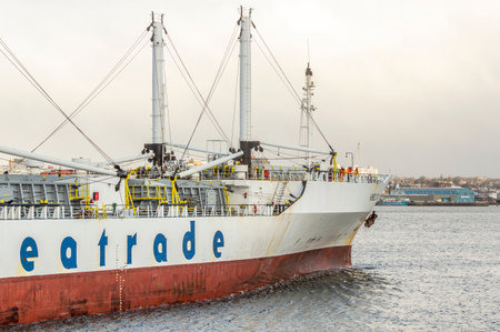 New Bedford, Massachusetts, USA - March 25, 2018: Refrigerated cargo ship Humboldt Bay makes her way toward State Pierのeditorial素材