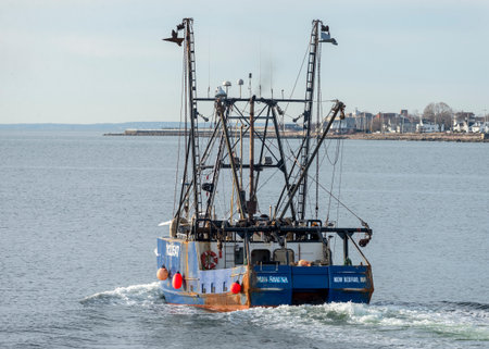New Bedford, Massachusetts, USA - March 23, 2018: Fishing vessel Miss Shauna heading toward Buzzards Bayのeditorial素材