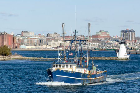 New Bedford, Massachusetts, USA - April 9, 2018: Commercial fishing vessel Tom Slaughter II, hailing port Gloucester, Massachusetts, crossing New Bedford harborのeditorial素材