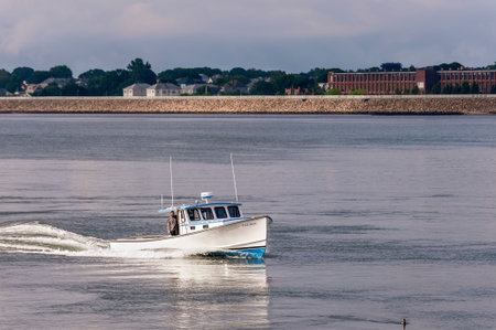 New Bedford, Massachusetts, USA - July 1, 2020: Lobster boat Illusion, hailing port Mattapoisett, MA, heading into New Bedfordのeditorial素材