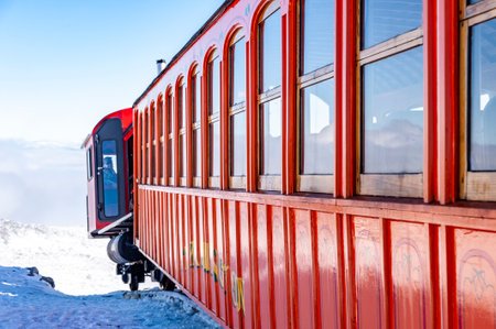 Mount Washington, New Hampshire, USA - October 2, 2009:  Cog Railway locomotive appears to be hanging over precipice at summit of mountainのeditorial素材