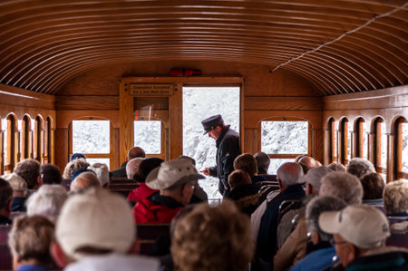 Mount Washington, New Hampshire, USA - October 2, 2009: Brakeman and passengers relax as Cog Railway train inches its way up the steep mountainのeditorial素材
