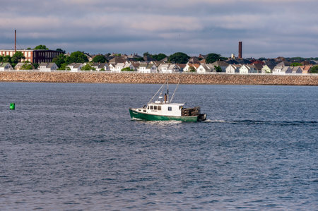 New Bedford, Massachusetts, USA - July 7, 2020: Lobster boat Mona M outbound in New Bedford outer harborのeditorial素材
