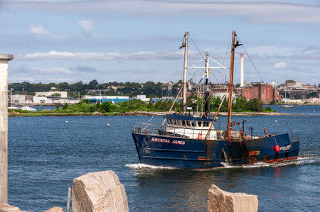 New Bedford, Massachusetts, USA - July 11, 2020: Commercial fishing boat Krystal James, hailing port Westport, Maine, crossing New Bedford outer harborのeditorial素材