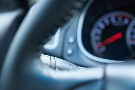 Close up of the steering wheel of a modern car. selective focus.