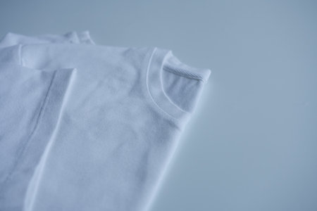 White t-shirt on a white background. close-up.の写真素材