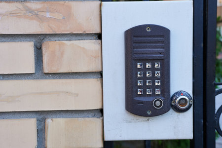 Security keypad on the wall in the house. Security concept.