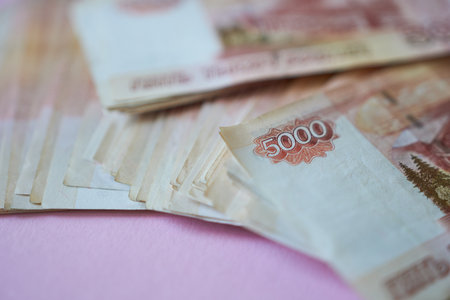 Russian ruble banknotes on a pink backgroundの写真素材