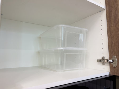 Plastic storage box in the kitchen, close-up of photo