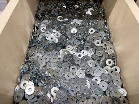 A close-up of the many metal washers in the box