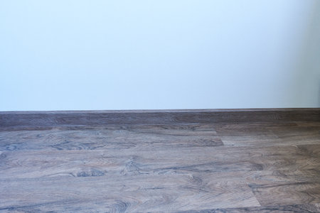 Wooden floor and wall in a room with copy space for text