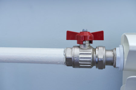 Water valve on the heating system, close-up of the valveの写真素材