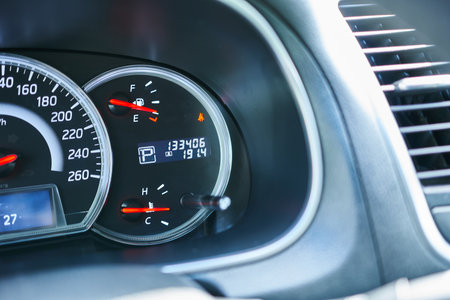 Close-up of the fuel level gauge in a modern car, note the shallow depth of field.の写真素材