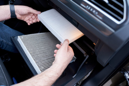Car air filter in auto repair shop. Auto service industry. Automotive backgroundの写真素材
