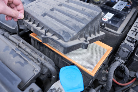 Car air filter in the engine compartment, close-up view.の写真素材