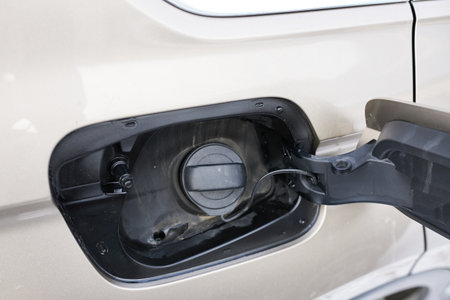 Close-up of an open petrol tank lid of a car.の写真素材