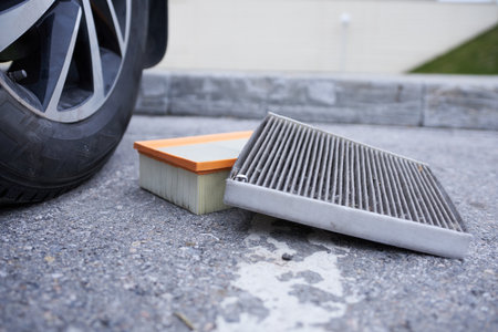 Car air filter on the street. Close-up. Selective focus.