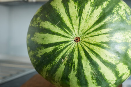Ripe watermelon on the kitchen table. Close-up.の写真素材