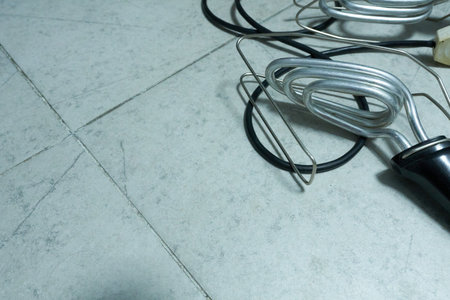 Shoe dryers on the floor, close-up.