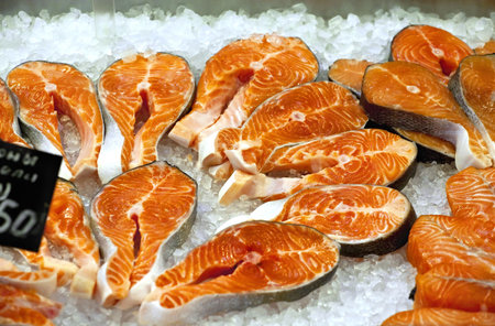 Appetizing pieces of red fish in the fish market