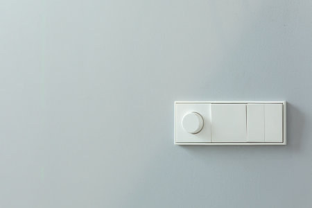 installation of switches and controls for lighting on a white wall