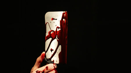 Blood covered hatchet.の写真素材