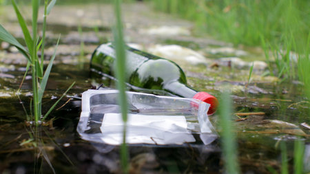 Close up of Junk in a Heavily Polluted Pondの写真素材