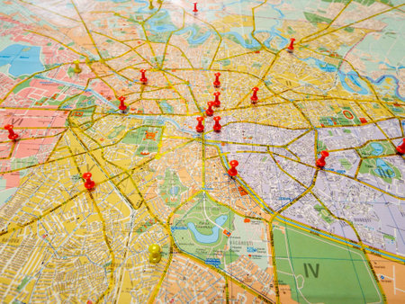 Pushpin marking a location on a road map