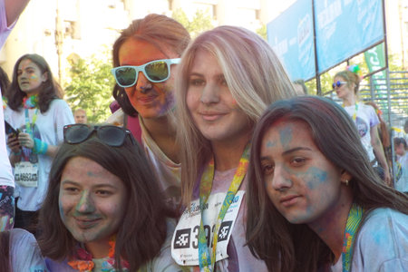 The Color Run. Close-up of marathon, people covered with colored powder.のeditorial素材
