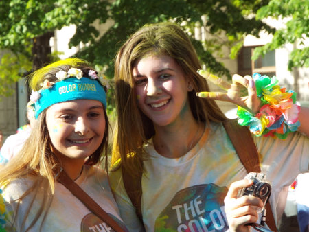 The Color Run. Close-up of marathon, people covered with colored powder.