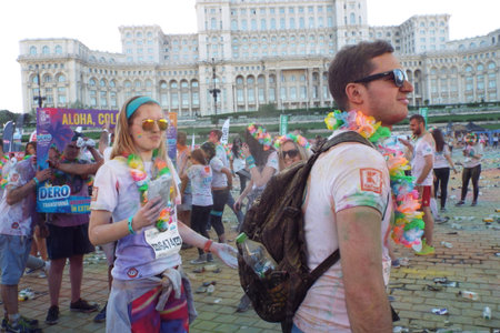 The Color Run. Close-up of marathon, people covered with colored powder.
