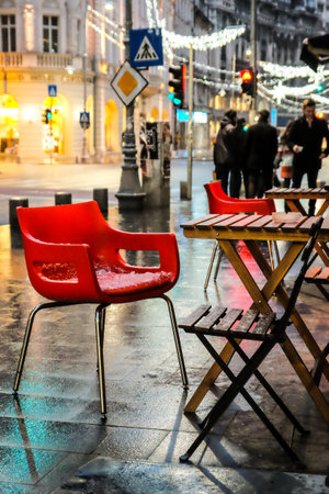 Sidewalk cafe. Cafe table and chairs on sidewalk.の写真素材