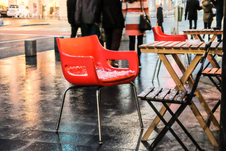 Sidewalk cafe. Cafe table and chairs on sidewalk.の写真素材