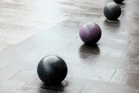 Decorative balls on the sidewalkの写真素材