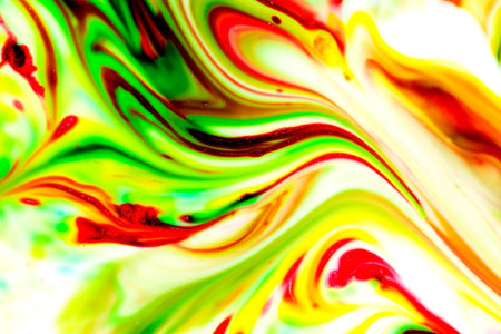 Colored paint stains smeared in a chaotic messの写真素材