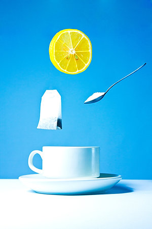 A cup of tea with lemon and sugarの写真素材