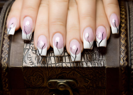 Female hands, nails with beautiful Art manicure の写真素材