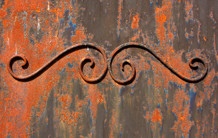 Wrought iron door element coated with rustの写真素材