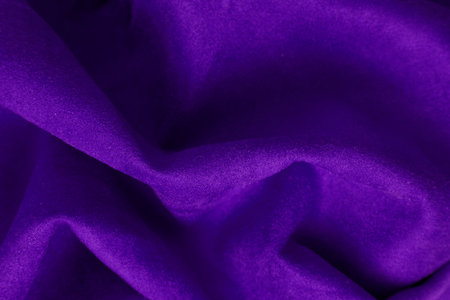 texture of purple velvet with foldsの写真素材