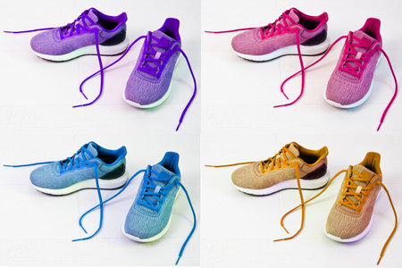 Beautiful women's sports sneakers with untied lacesの写真素材