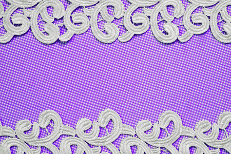 White Lace on a colored background. Place for inscription.の写真素材