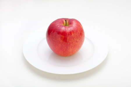 apple on dishの写真素材