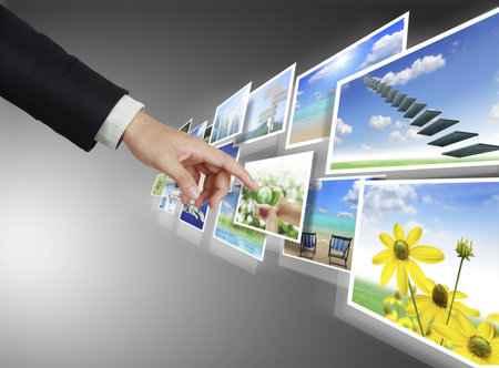 hand pushing on a touch screen interface の写真素材