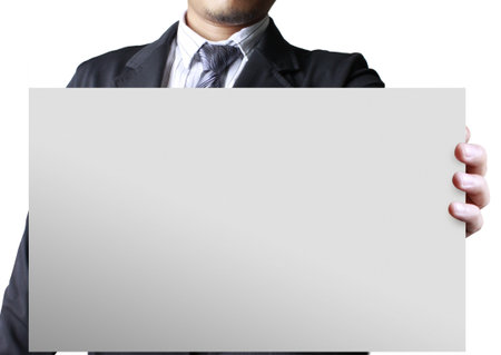Businessman holding white billboard の写真素材